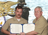 Tom receiving Bronze Star